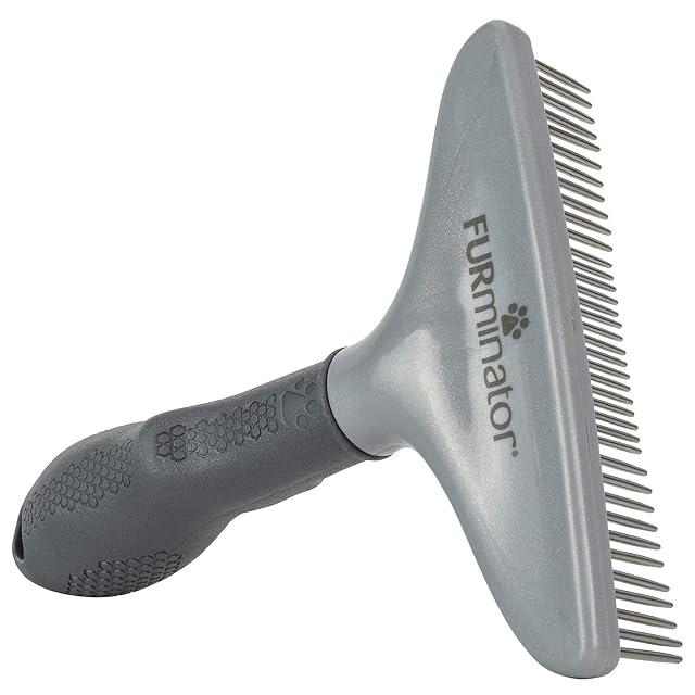FURminator rake comb with rotating stainless teeth
